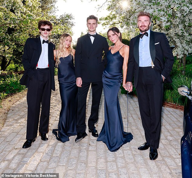 Victoria Beckham 's rift with her son Brooklyn has become 'her worst nightmare,' sources have claimed (pictured with husband David, sons Romeo and Cruz and daughter Harper)