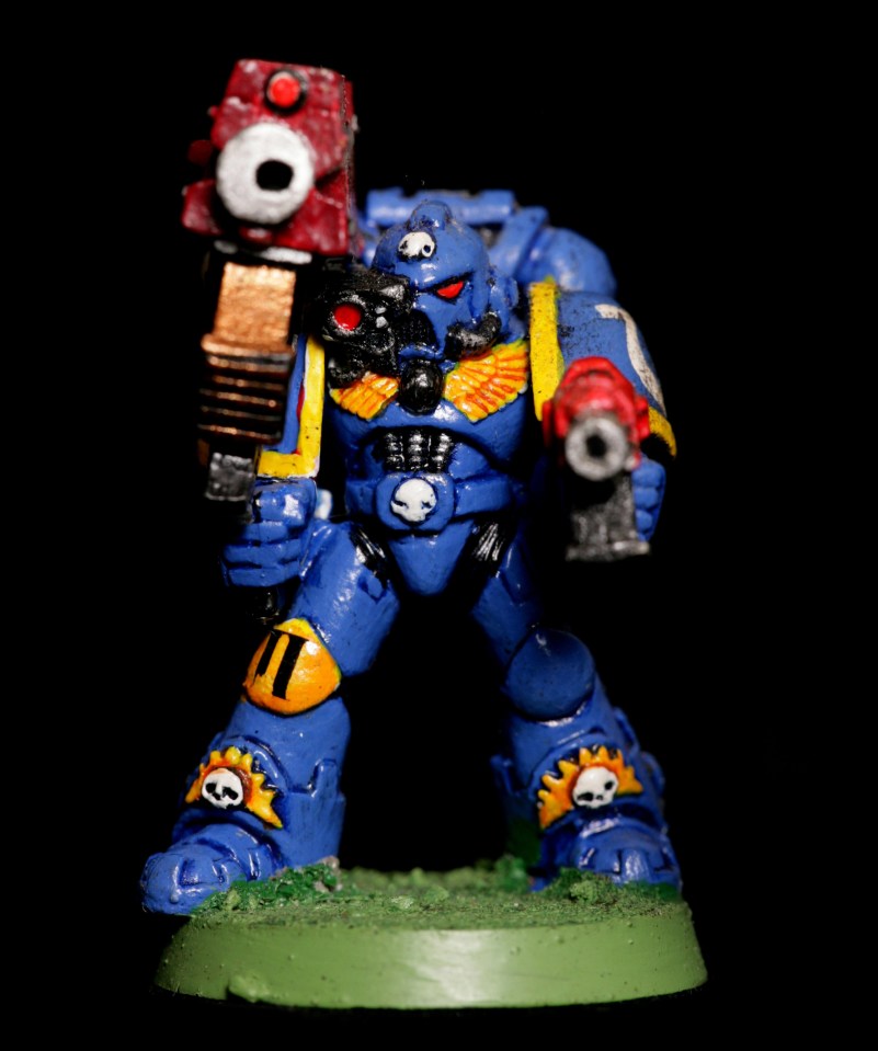 Painted Warhammer Ultramarines figure.