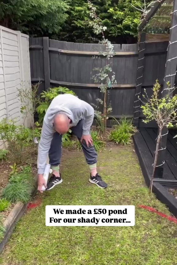 Man outlining a £50 pond in a garden.