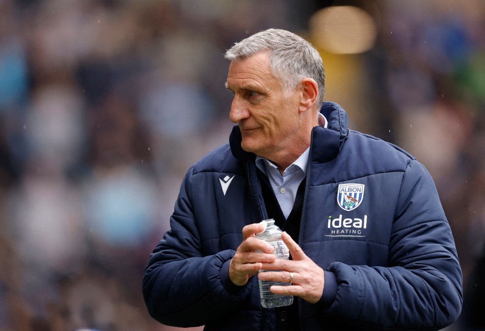Tony Mowbray, West Bromwich Albion manager, holding a water bottle.