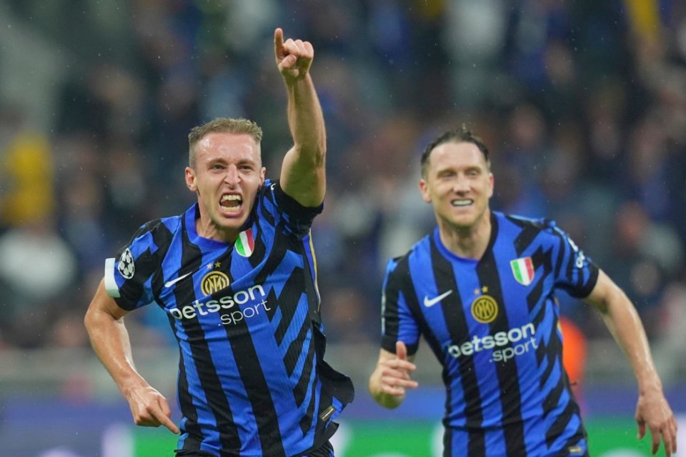 Inter Milan's Davide Frattesi, left, celebrates after scoring his side's fourth goal during the Champions League semifinal second leg soccer match between Inter Milan and Barcelona at San Siro stadium in Milan, Italy, Tuesday, May 6, 2025 (Spada/LaPresse via AP)