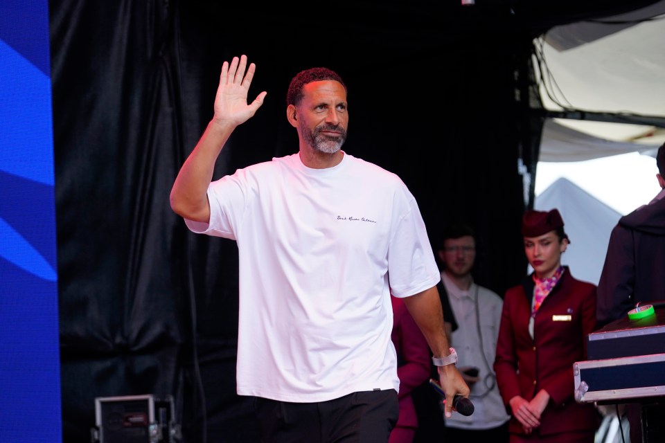 Rio Ferdinand waving at a Champions Festival event.