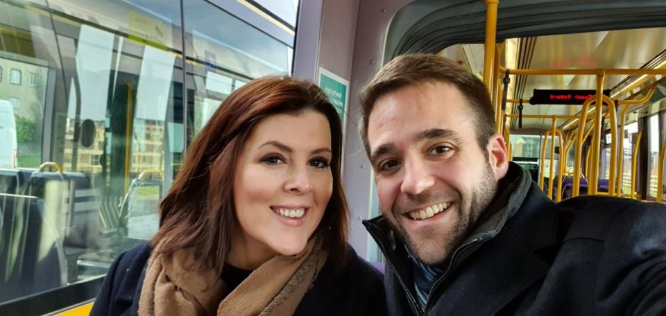 Niamh and Stephen Spence with their daughter Evie on a tram.