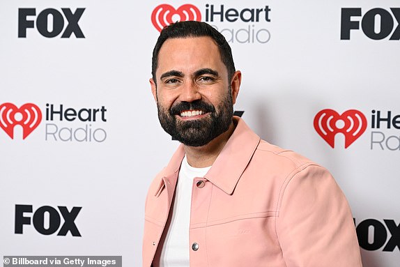 Enrique Santos at the 2025 iHeartRadio Music Awards held at the Dolby Theatre on March 17, 2025 in Los Angeles, California. (Photo by Gilbert Flores/Billboard via Getty Images)