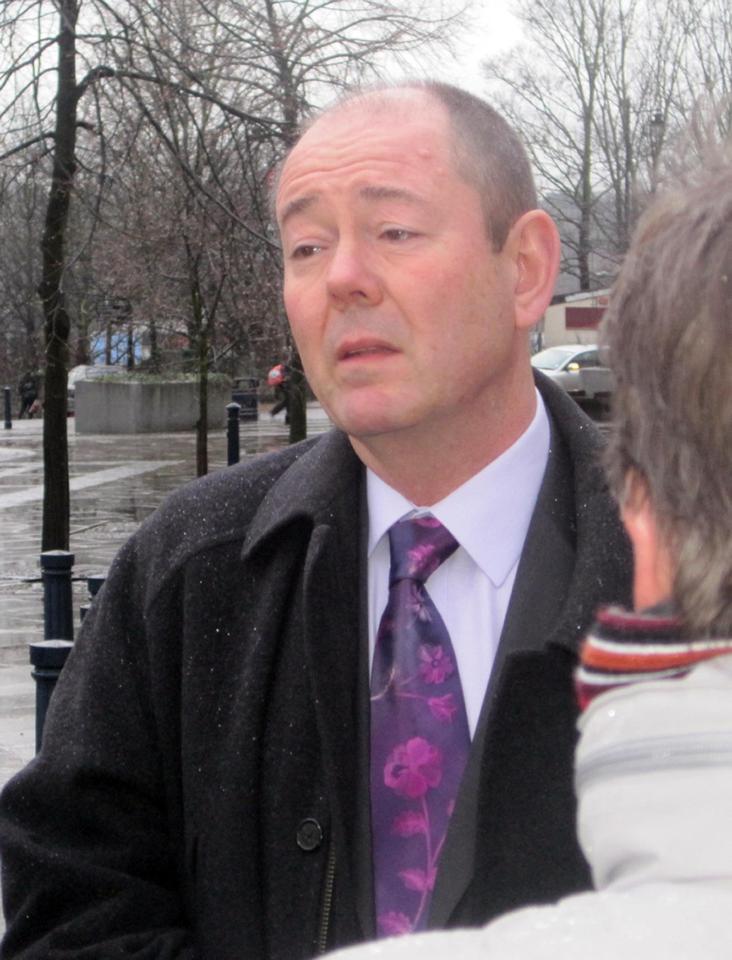 Julian Foulkes, father of Francesca Foulkes, speaks outside a courthouse.