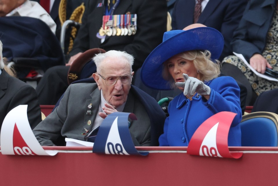 Queen Camilla and a World War II veteran at a VE Day commemoration.