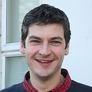 A world champion bagpiper caused tens of thousands of pounds worth of damage during a drunken wrecking spree in his £45,000 electric car. Accountant Jonathan Greenlees (pictured) smashed into four other cars - including the same one twice - while he was more than three times over the limit