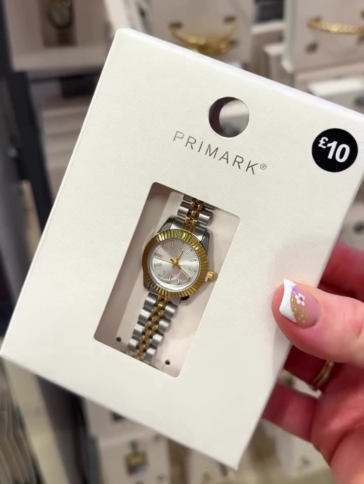 Primark watch with a gold and silver band.