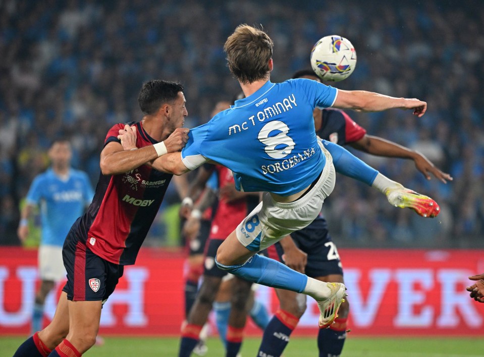 Soccer player Scott McTominay scoring a goal.