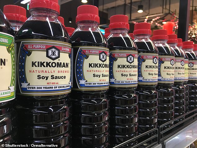 While many store soy sauce in the cupboard once opened, experts at Cookology have revealed that it actually belongs in the fridge (stock image)
