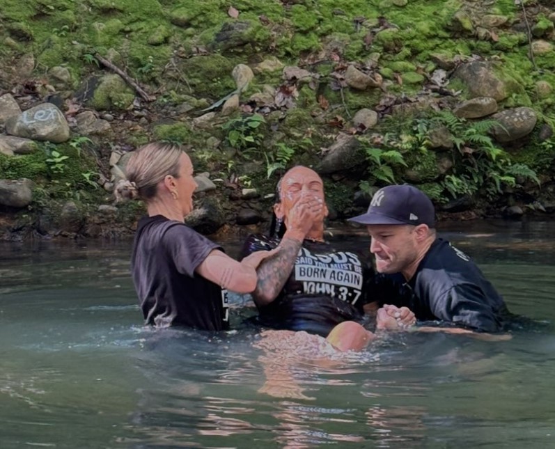 Hayley Vernon's baptism in a stream.