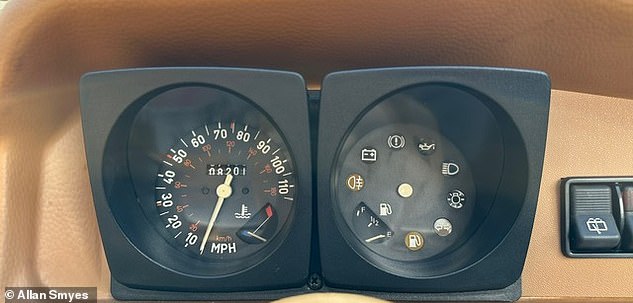 The basic instrument cluster shows the Yugo's mere 8,000-mile history