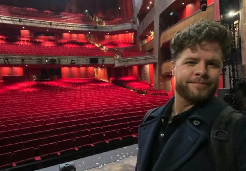 Man in a theater.