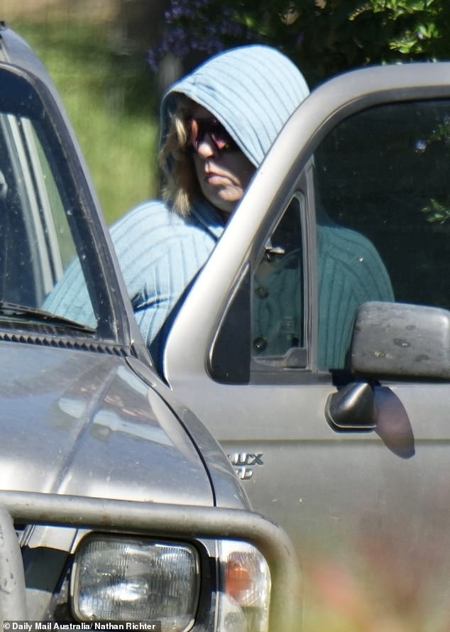 Bromley visited the local police station as part of her bail conditions, trying to hide her face and shunning questions from reporters