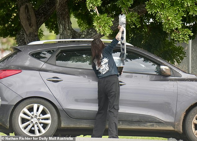 Daily Mail Australia witnessed Wood being confronted by an irate local as he slept in the driver's seat of his car under a tree in a local park