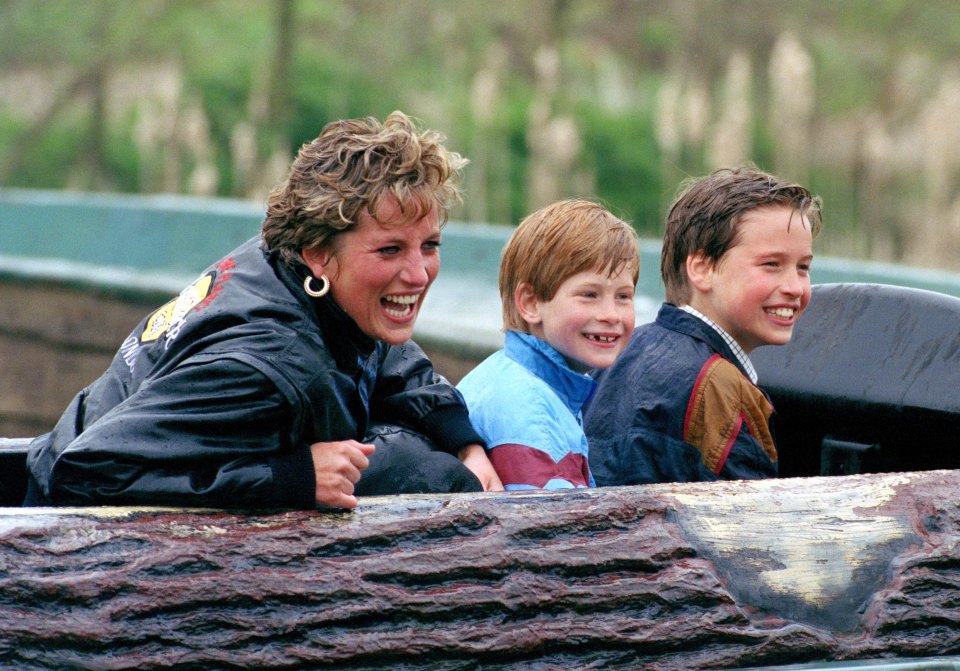 Princess Diana with Princes William and Harry at an amusement park.
