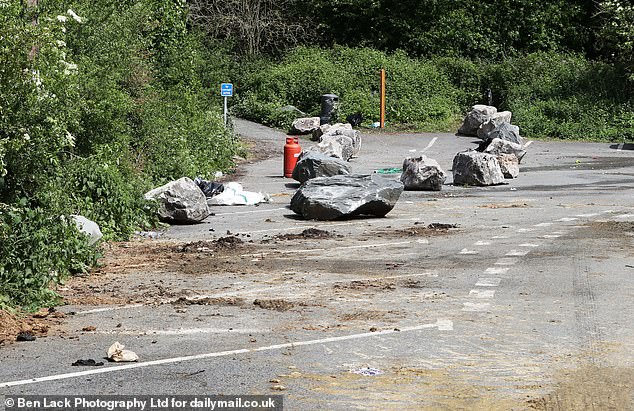Ppiles of rubbish and gas canisters were dumped at the roadside as some gypsies left to continue their journey towards Appleby.