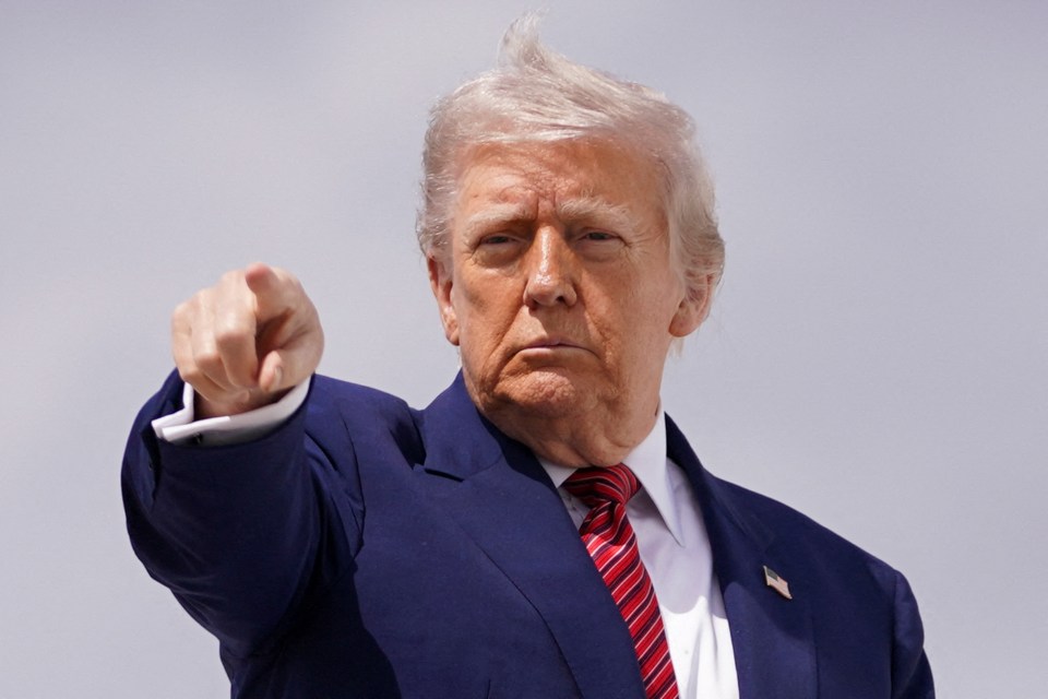 Donald Trump pointing.