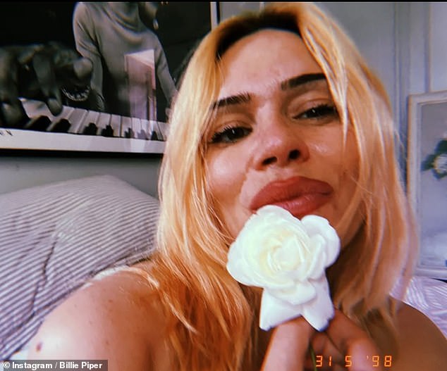 Billie herself then seemed to further fuel the speculation with a cryptic Instagram post, which showed herself posing with a white rose