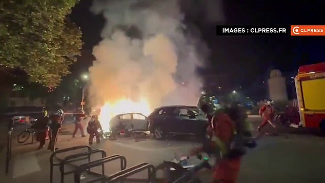 Footage showed a car was even set on fire, forcing firefighters to battle the blaze