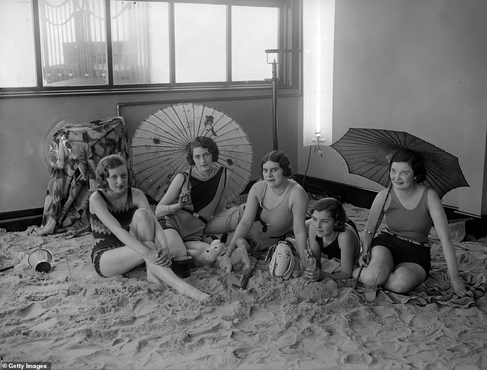 A group of female holidaymakers are photographed as they enjoy the solarium at the Tolland Hotel in Bournemouth in 1930. Solariums were generally designed to allow tourists to enjoy the sun even when it was windy