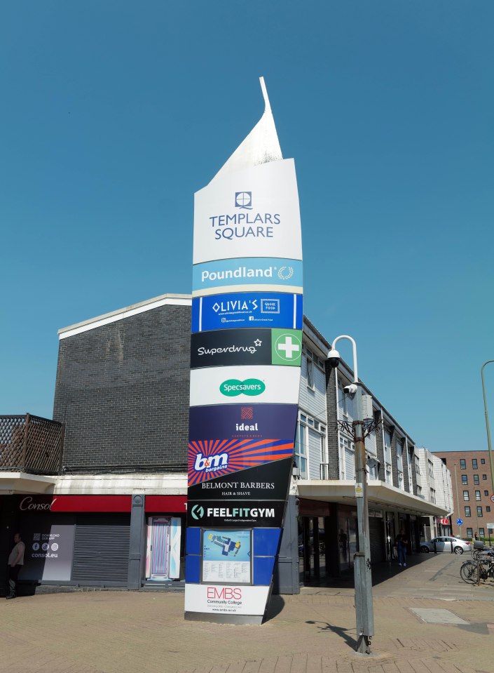 Sign listing stores in Templars Square shopping center.