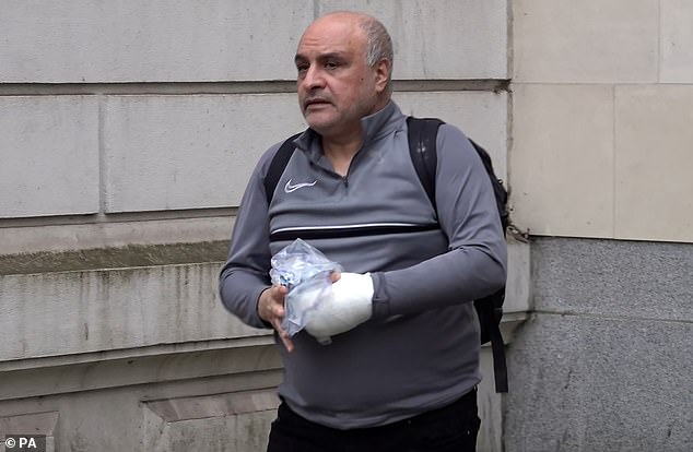 Hamit Coskun leaves Westminster Magistrates' Court in February, where he was charged with intent to cause harassment, alarm or distress against the religious institution of Islam