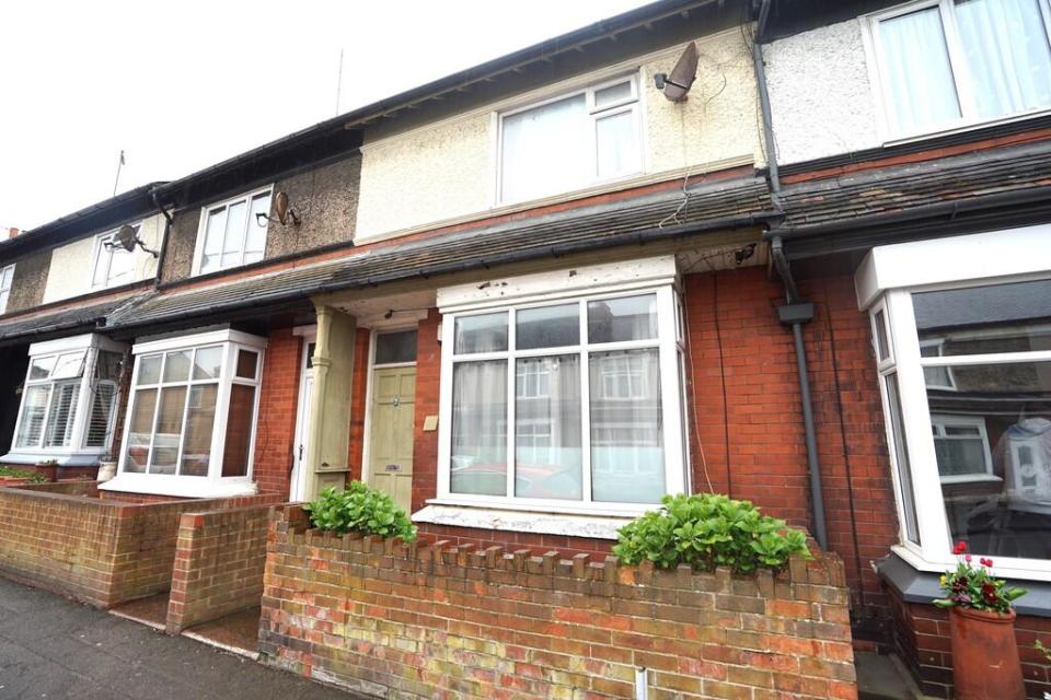 Terraced house with bay window.