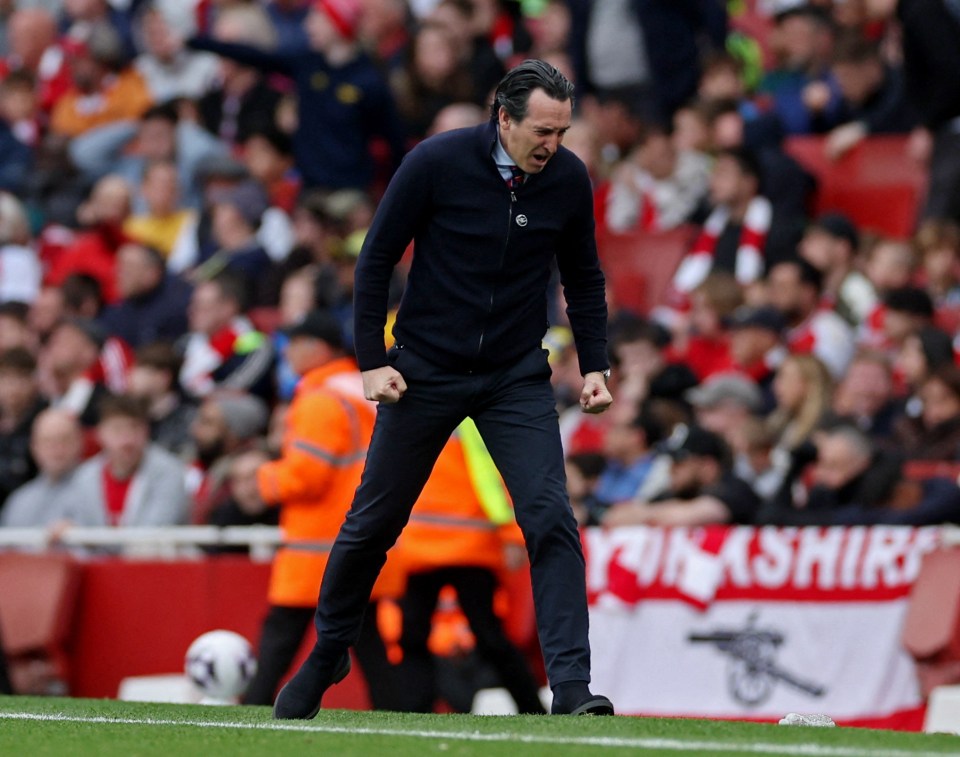 Unai Emery celebrating on the soccer field.