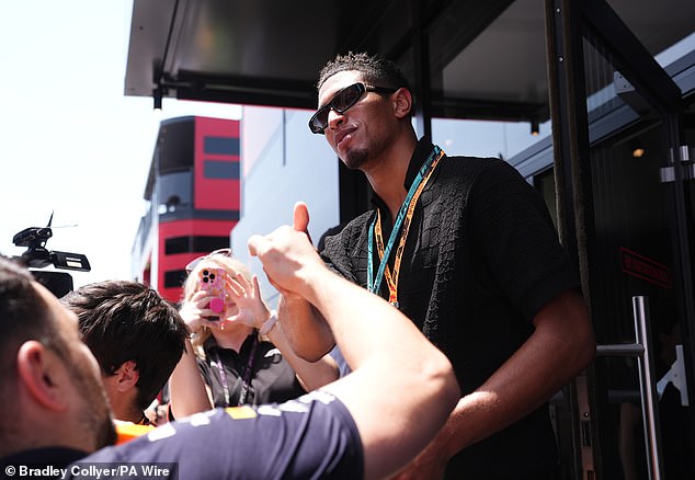 Jude Bellingham pictured interacting with fans in the paddock area before Sunday's race