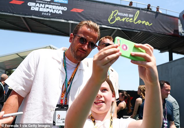 England captain Harry Kane pictured posing for a selfie with a young fan at the Spanish GP