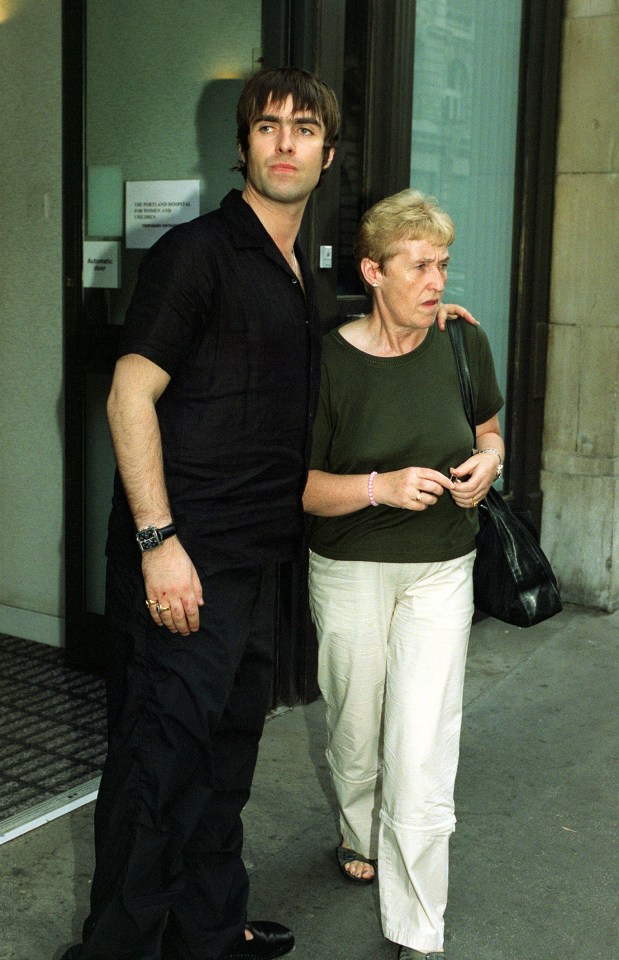 Liam Gallagher and his mother leaving a hospital.