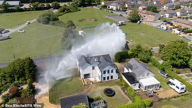 The scene in Sneedhams Green in Matson, Gloucester, after a water main pipe burst earlier this month. Last year a report by the Environment Agency found that almost a fifth (19 per cent) of water supplies are lost by water companies before reaching customers' taps.
