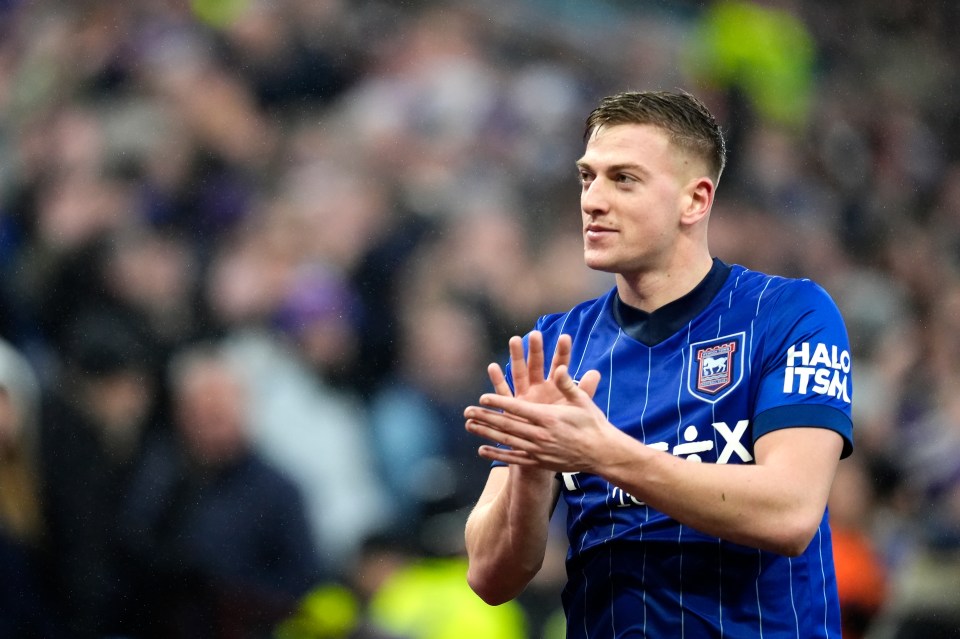 Liam Delap of Ipswich Town applauding fans.