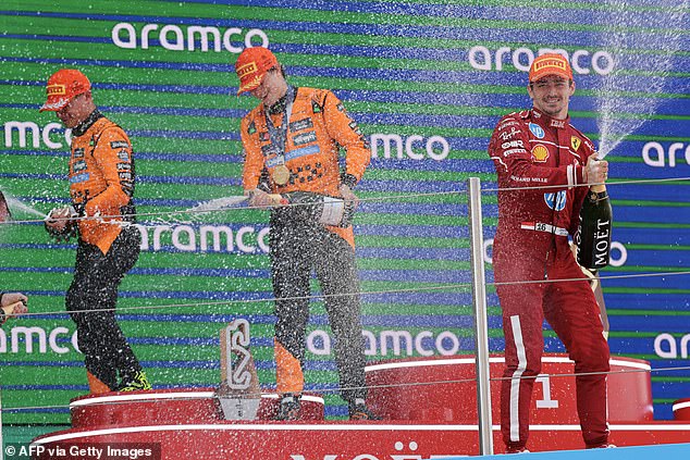 Piastri (centre) now leads Norris (left) by 10 points after nine rounds, following his brilliant start to the season
