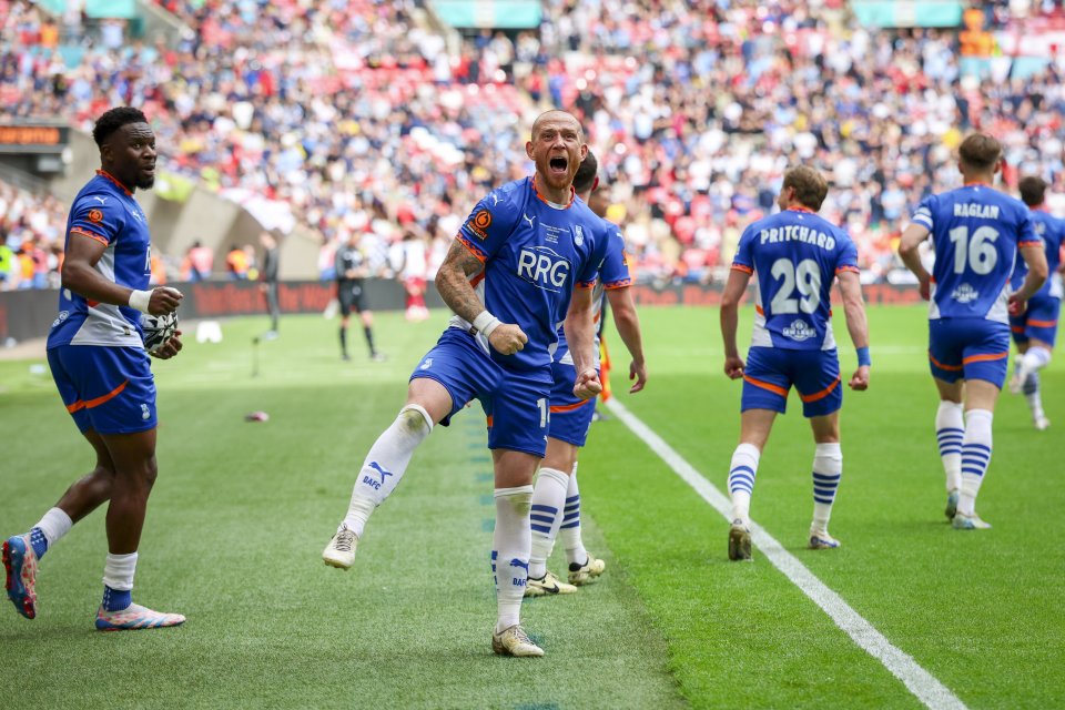 Soccer player celebrating a goal.
