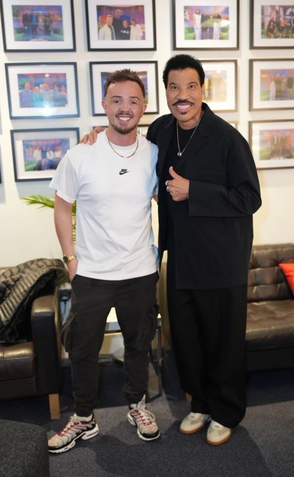 Lionel Richie with a fan.