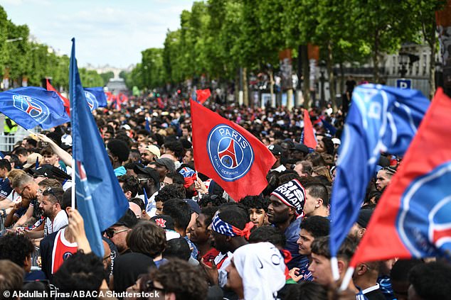 Despite the violence, there was a carnival atmosphere in Paris as fans waved flags, lit flares and belted out the Queen anthem 'We Are The Champions'