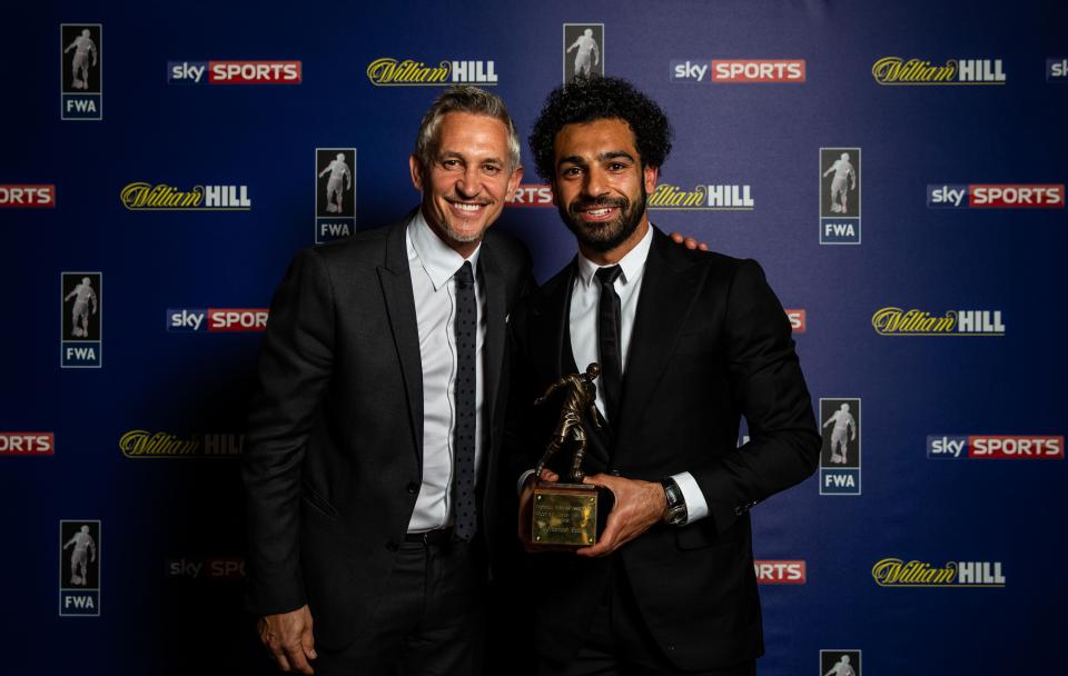 Mohamed Salah accepting the FWA Footballer of the Year award with Gary Lineker.