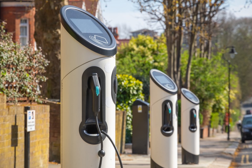 Electric car charging stations on a residential street.