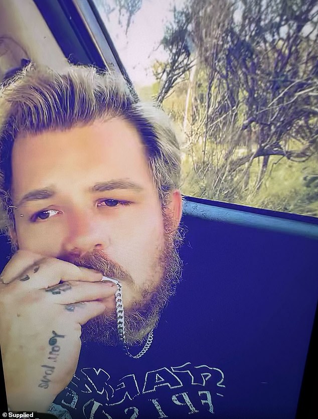 Heavily filtered, Wood lip-syncs to the love song Perfect by Ed Sheeran, dramatically closing his eyes and then biting the silver chain around his neck.