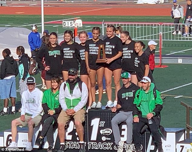 Athletes from a rival school wore black T-shirts that read 'Keep Women¿s Sports Female'
