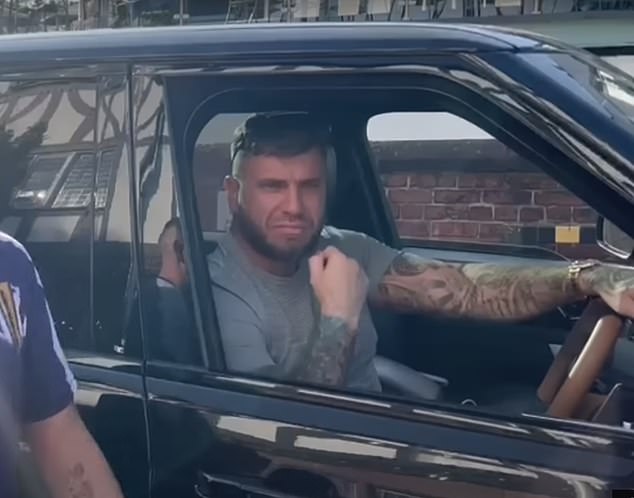 Joyce pictured driving in a fancy 4x4 car which he regularly flaunts on social media