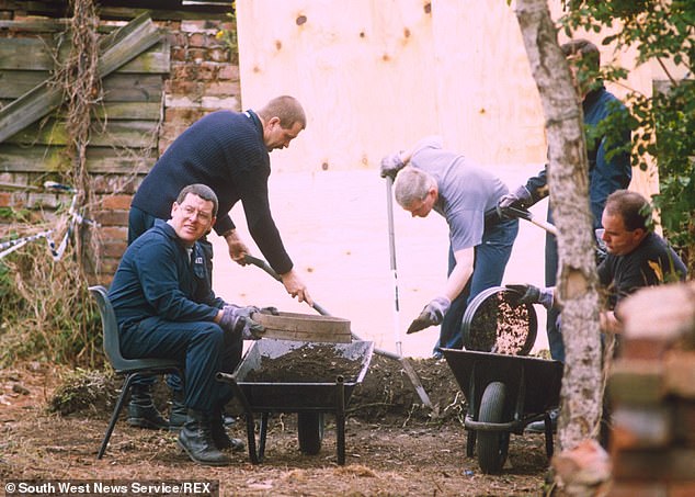 Pictured: Police searching through materials in the garden of Fred and Rose West's 'House of Horrors' in 1994