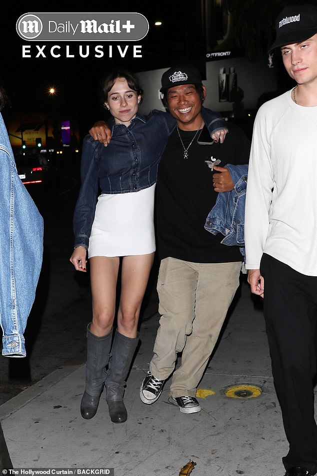 Even so, famous exes Jolie and Pitt's son seemed in great spirits, smiling widely as he chatted with his group of friends, which included four scantily clad women and one other guy