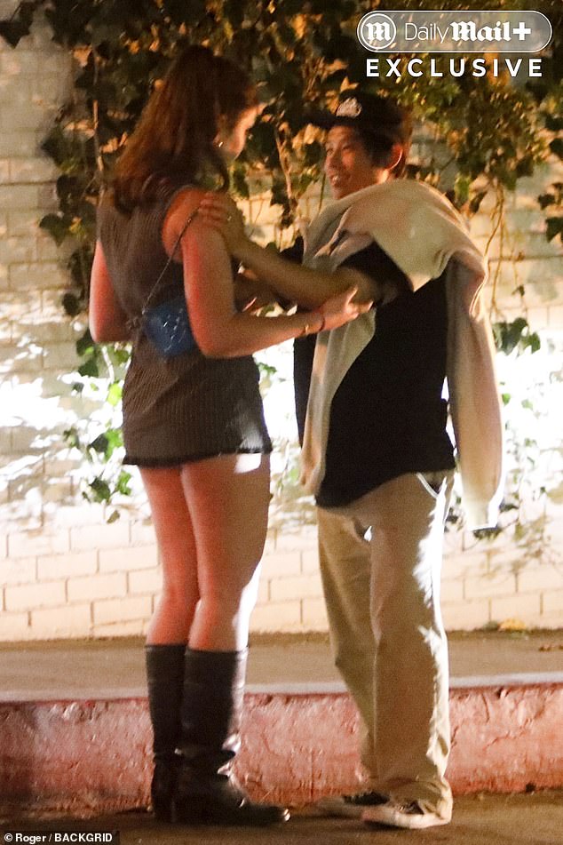 He and one of his female friends were seen sharing an intimate moment outside of the club