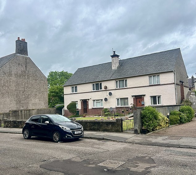 Two houses on a residential street in Campbeltown, near the town centre