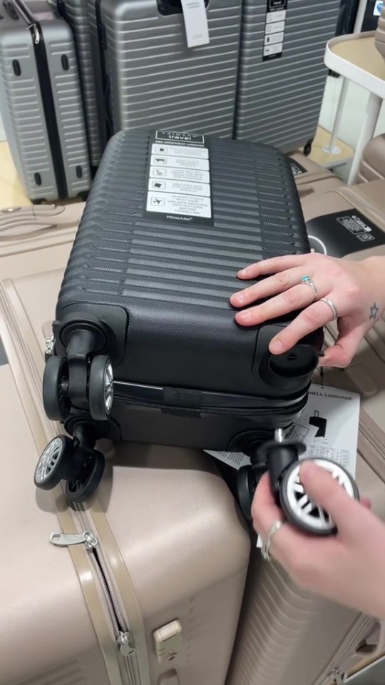 Primark underseat suitcase with removable wheels.