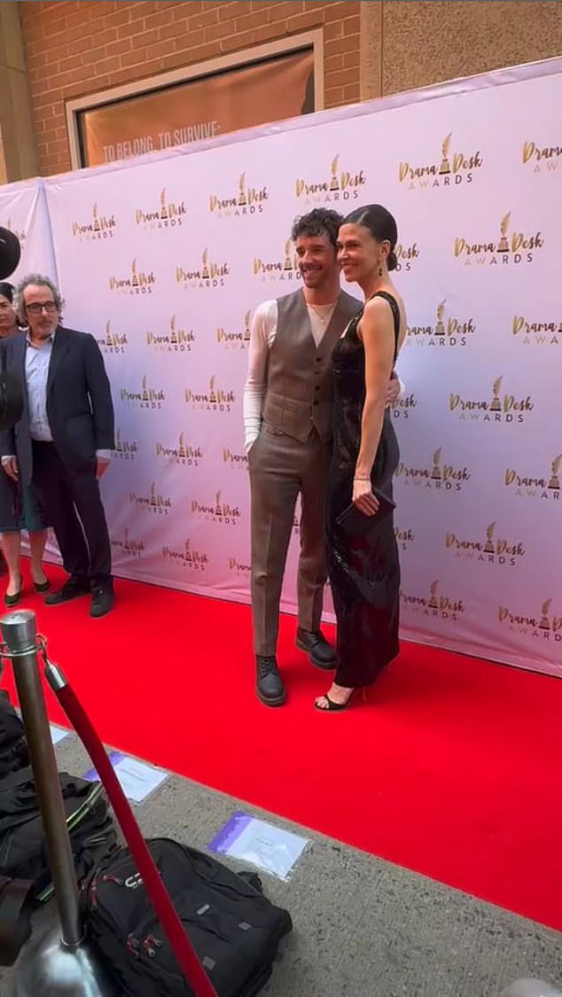 While stars like Nicole Scherzinger, Debra Messing, and Sarah Hyland paused for interviews, Foster clearly wanted to keep the spotlight on her performance—not her personal life; (posing with Michael Urie)