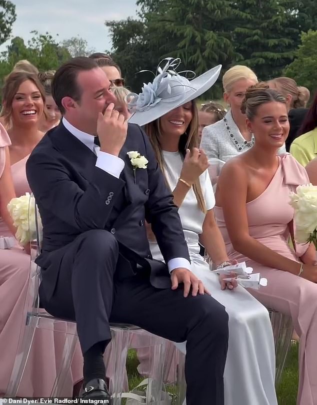 Danny was seen looking teary as he watched the ceremony alongside wife Joanna Mas and youngest daughter Sunnie